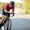 Young man feeling tired after long morning ride on road